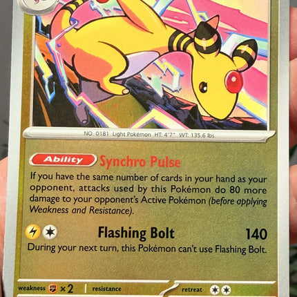 Carta individual Pokémon Ampharos Reverse 029/086, rareza rara, Stage 2, 160 HP, set Chaos Rising (CRI). Ilustración de estilo cómic y dinámico de Ampharos liberando destellos eléctricos por CHORISO - Thunder Cards México.