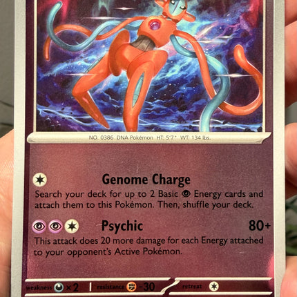 Carta individual Pokémon Deoxys Reverse 031/086, rareza infrecuente, Basic Pokémon, 110 HP, set Chaos Rising (CRI). Ilustración de Deoxys en Forma Normal flotando en el espacio profundo con auroras cósmicas de fondo por Shiburingaru - Thunder Cards México.